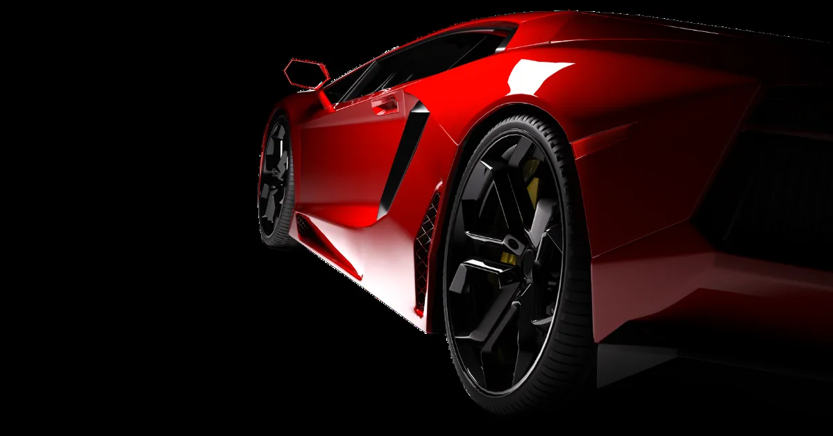 Red flagship supercar with gloss paint protection film in a dark studio
